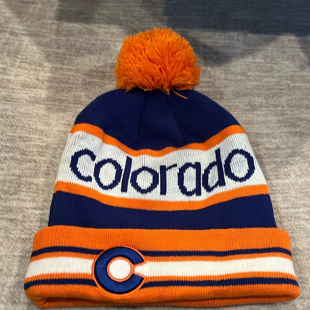 Colorado Limited blue orange white ski and cold weather beanie hat with Pom Pom